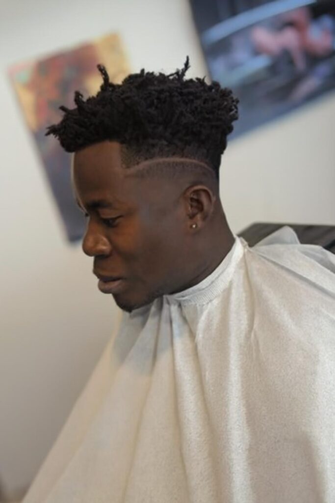 Low Taper Fade for Black Men 7 Drop Fade with Line Design