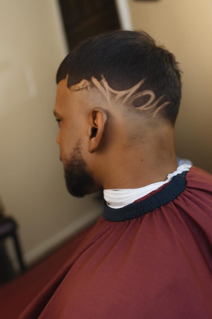 Low Taper Fade for Black Men 9 Low Drop Fade with Design