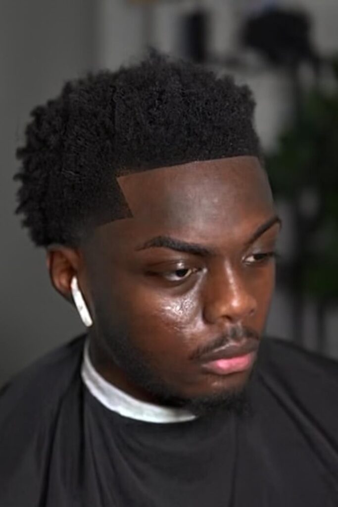 Low Taper Fade for Black Men 8 Low Taper Fade with Sponge Curls