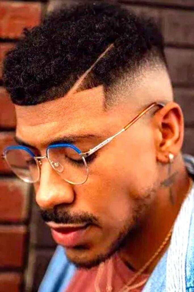 Low Taper Fade for Black Men 27 Taper Fade with Hard Part